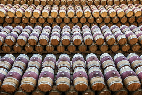 Reserve Wines | Barrels of wine in neat rows in a cellar in Rioja