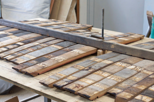 Staves on the straightening table at The Paper Rain Project