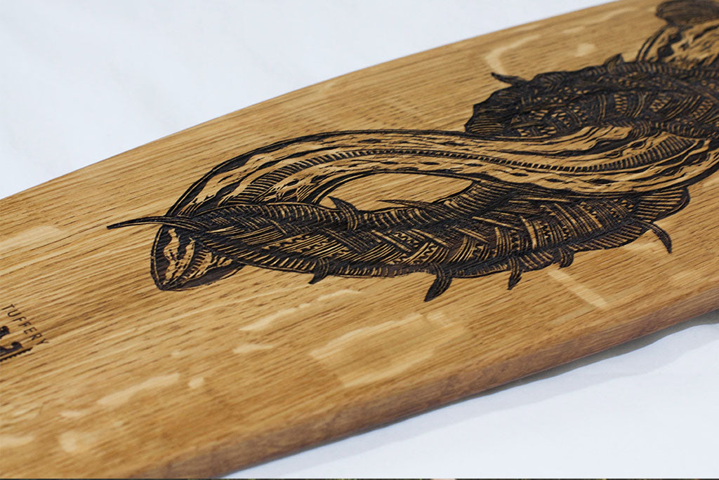 Michel Tuffery, Eels, recycled wine barrel longboard art in support of Working Waters Trust with The Paper Rain Project