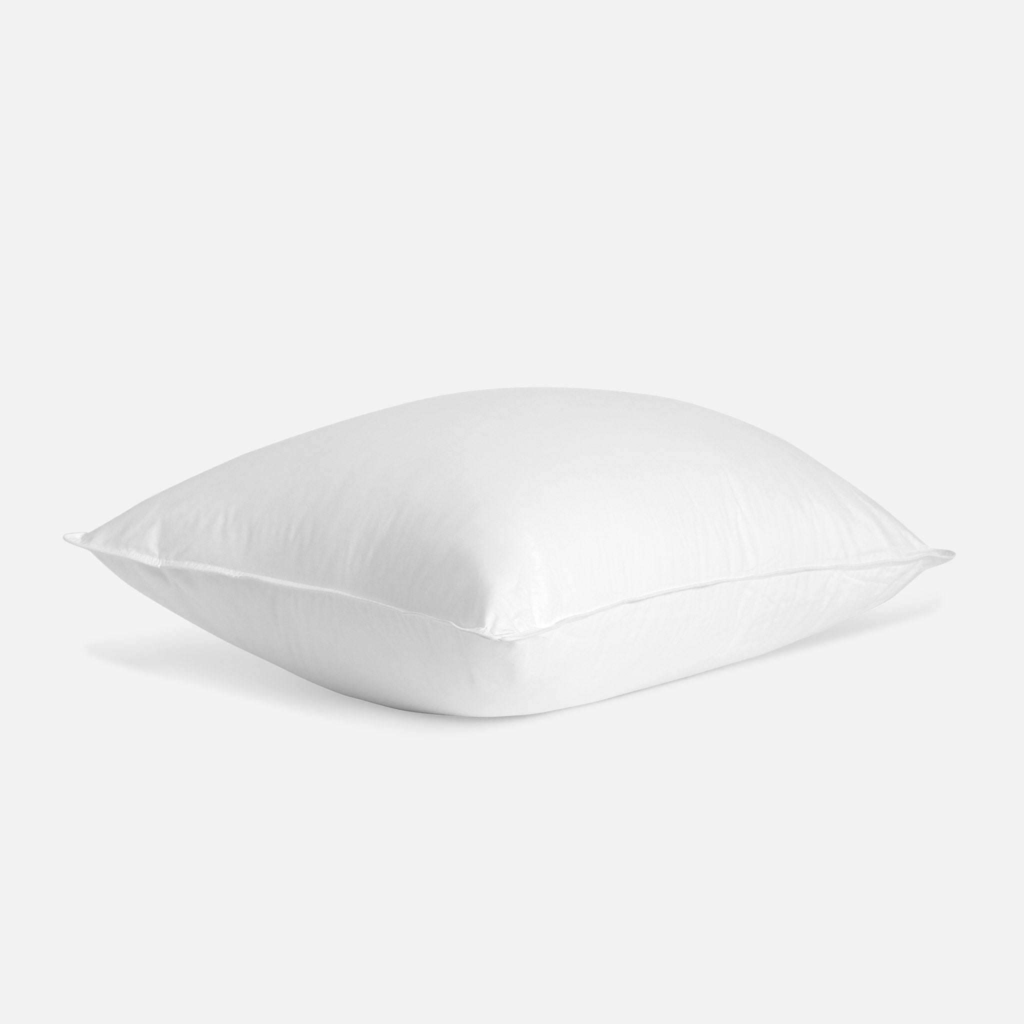 https://cdn.shopify.com/s/files/1/0951/7126/products/down_firm-pillow-insert_silo.jpg?v=1543513838