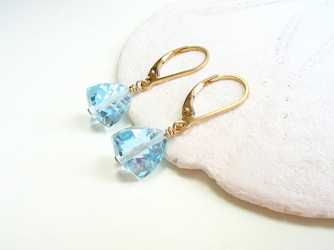 silver earrings with blue topaz