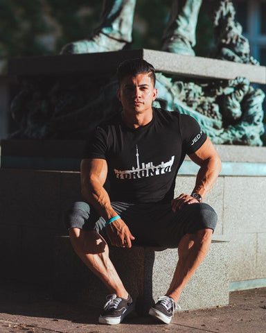 inspirational fitness influencer with moody edit in toronto shirt