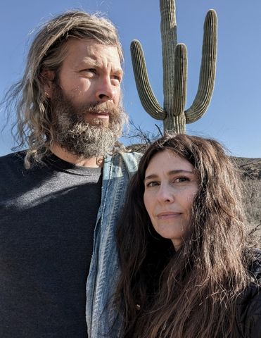 a man and a woman in the desert