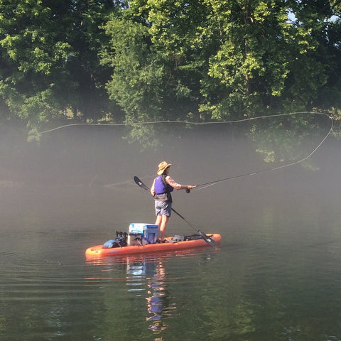 Canoe with Susan Thrasher Fly Fishing on a river
