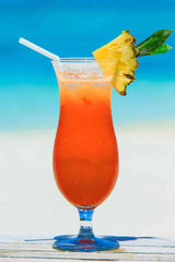 Tropical Island Breeze Drink Recipe in a hurricane glass - A mix of rum, vodka and tropical juices