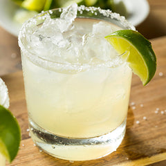 Easy Margarita Recipe In A Glass With a Slated Rim & Lime Wedge
