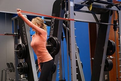 Overhead tricep extension with power band