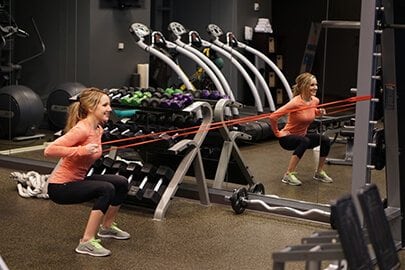 Row squats with power band