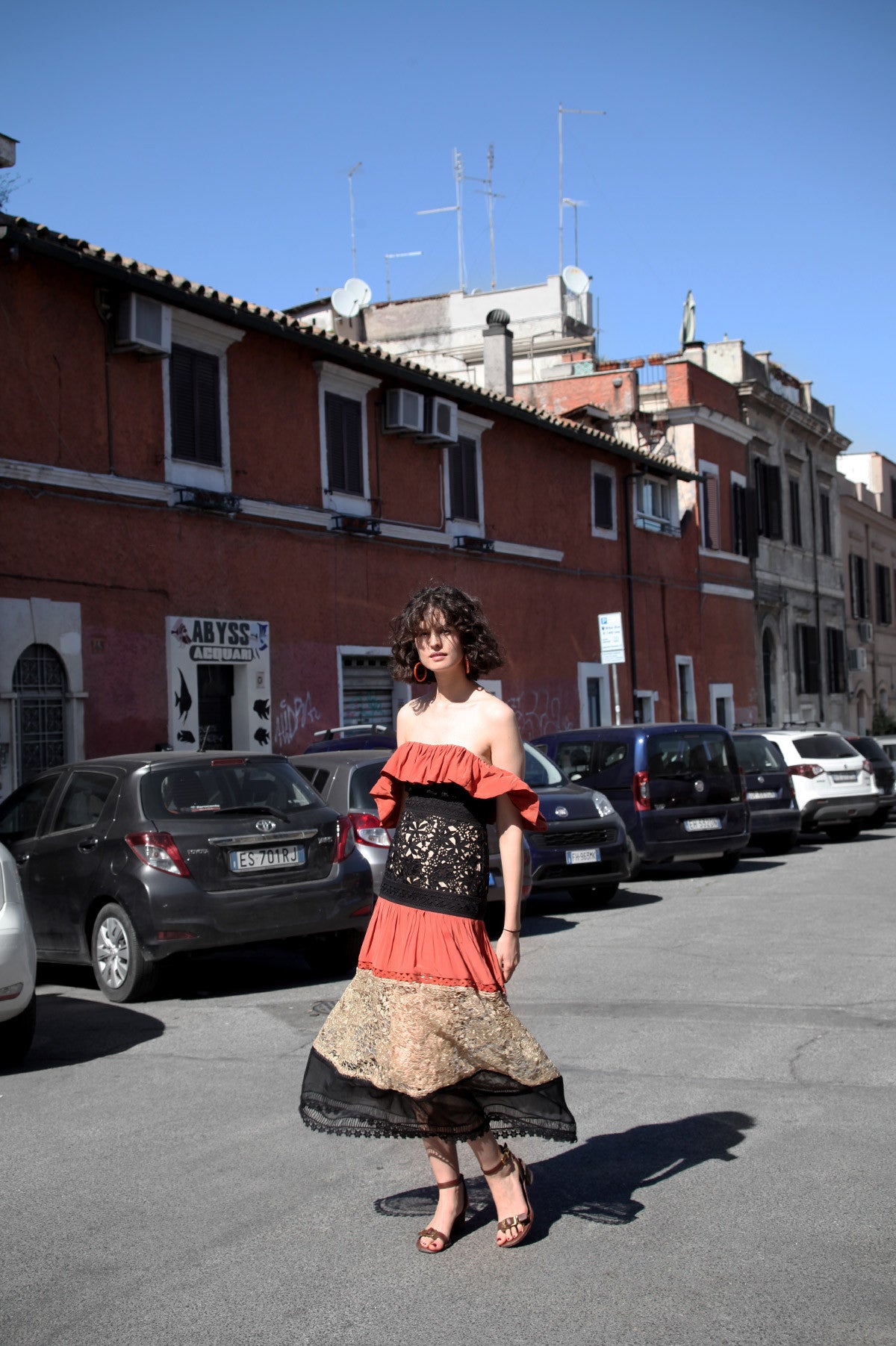 Chloe Hill wears the Talulah Mixed Emotions Maxi Dress in Rome 