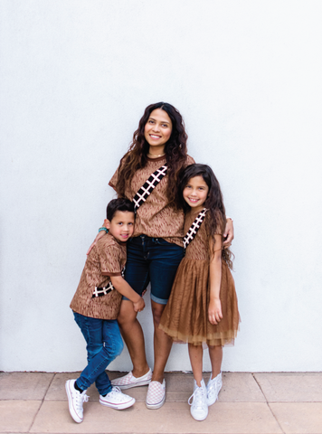 mom and son in chewbacca shirts, daughter in chewbacca dress