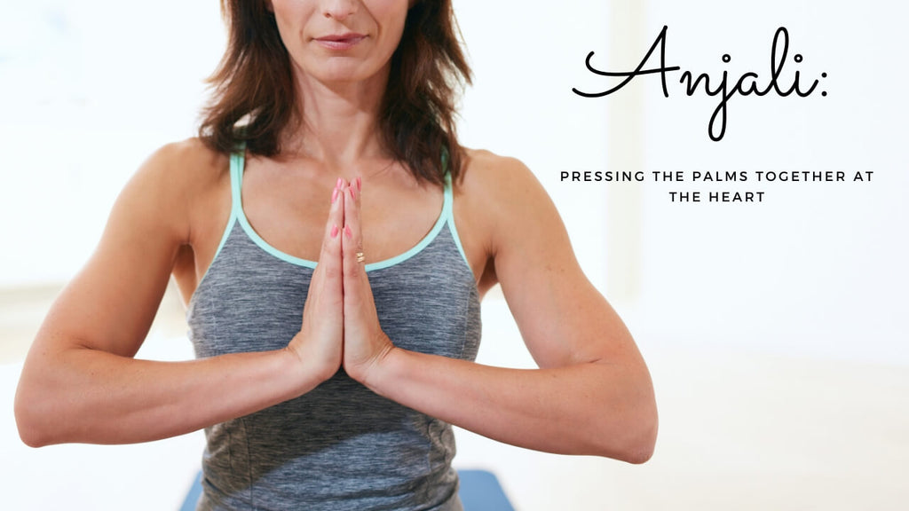 Anjali Yoga Term - Pressing the palms together at the heart.