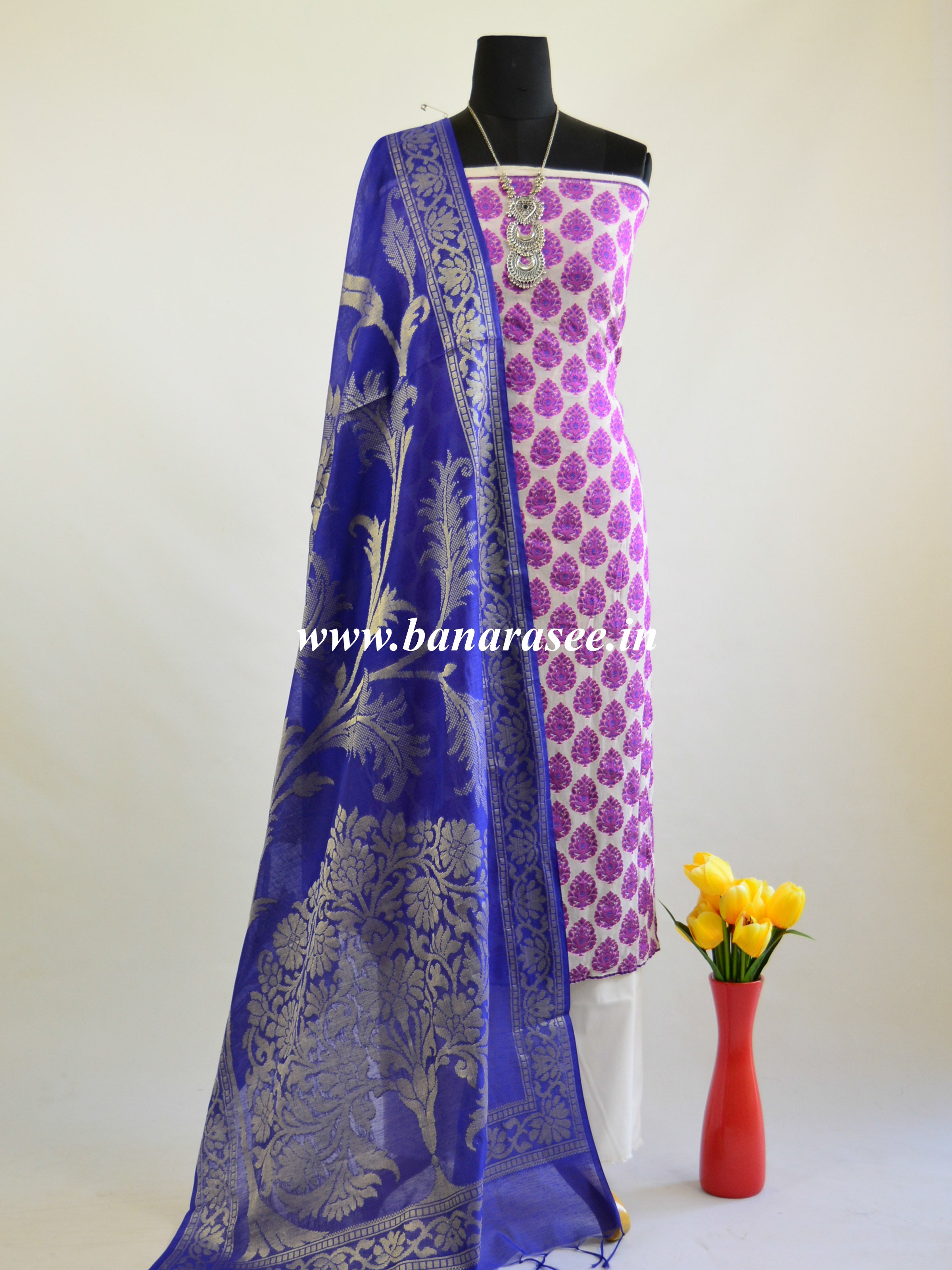 white salwar kameez with blue dupatta