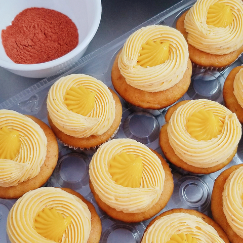 cupcakes with li hing mui powder on the side in a bowl