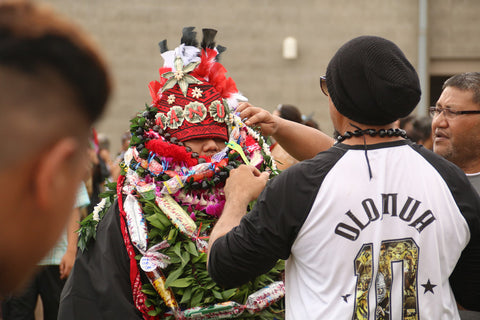 Manu with graduation leis