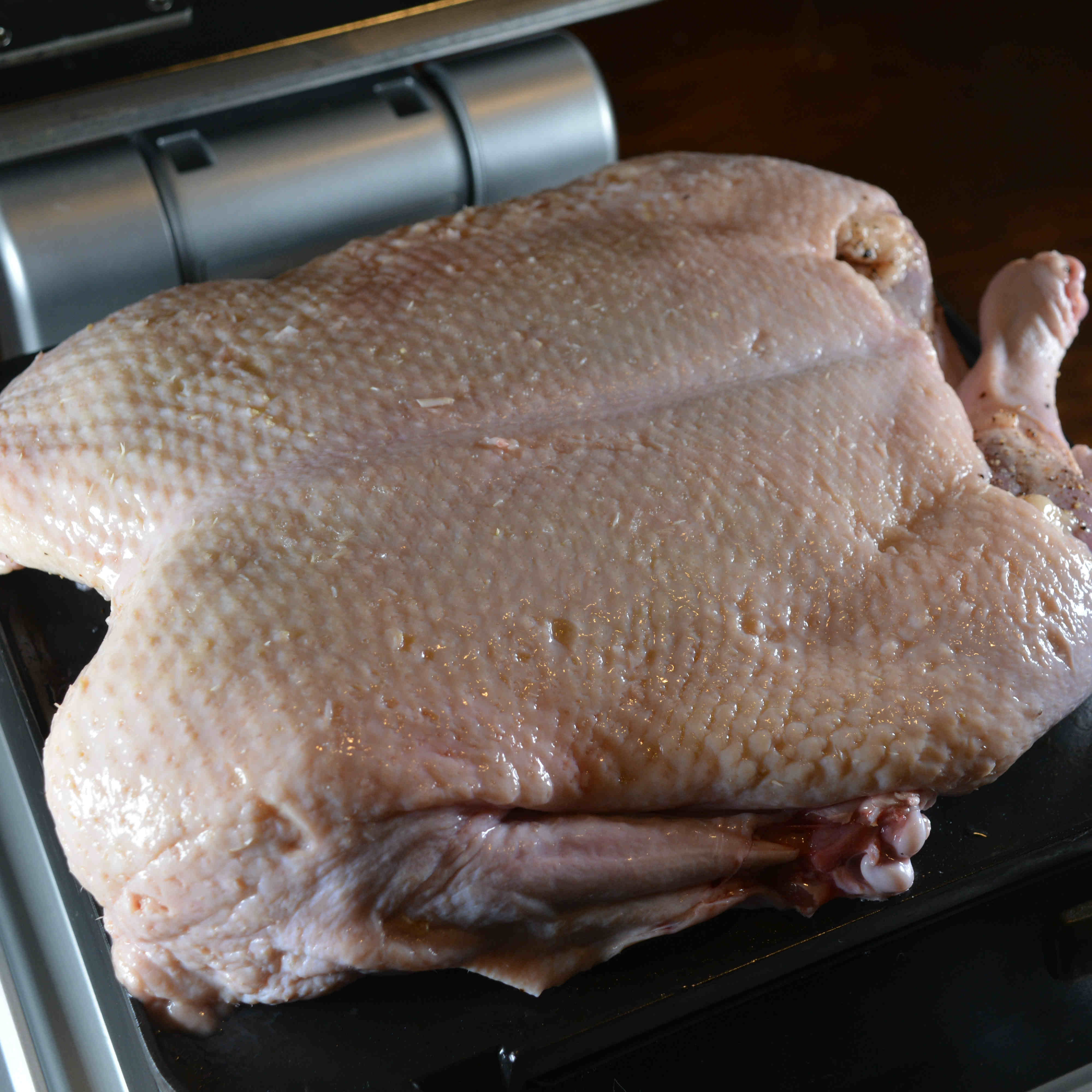 whole roasted duck cooked on cinder grill precision indoor grill that cooks like sous-vide