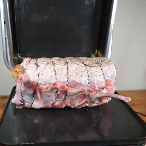 Pork Loin Roast cooking to juicy perfection on the Cinder Grill