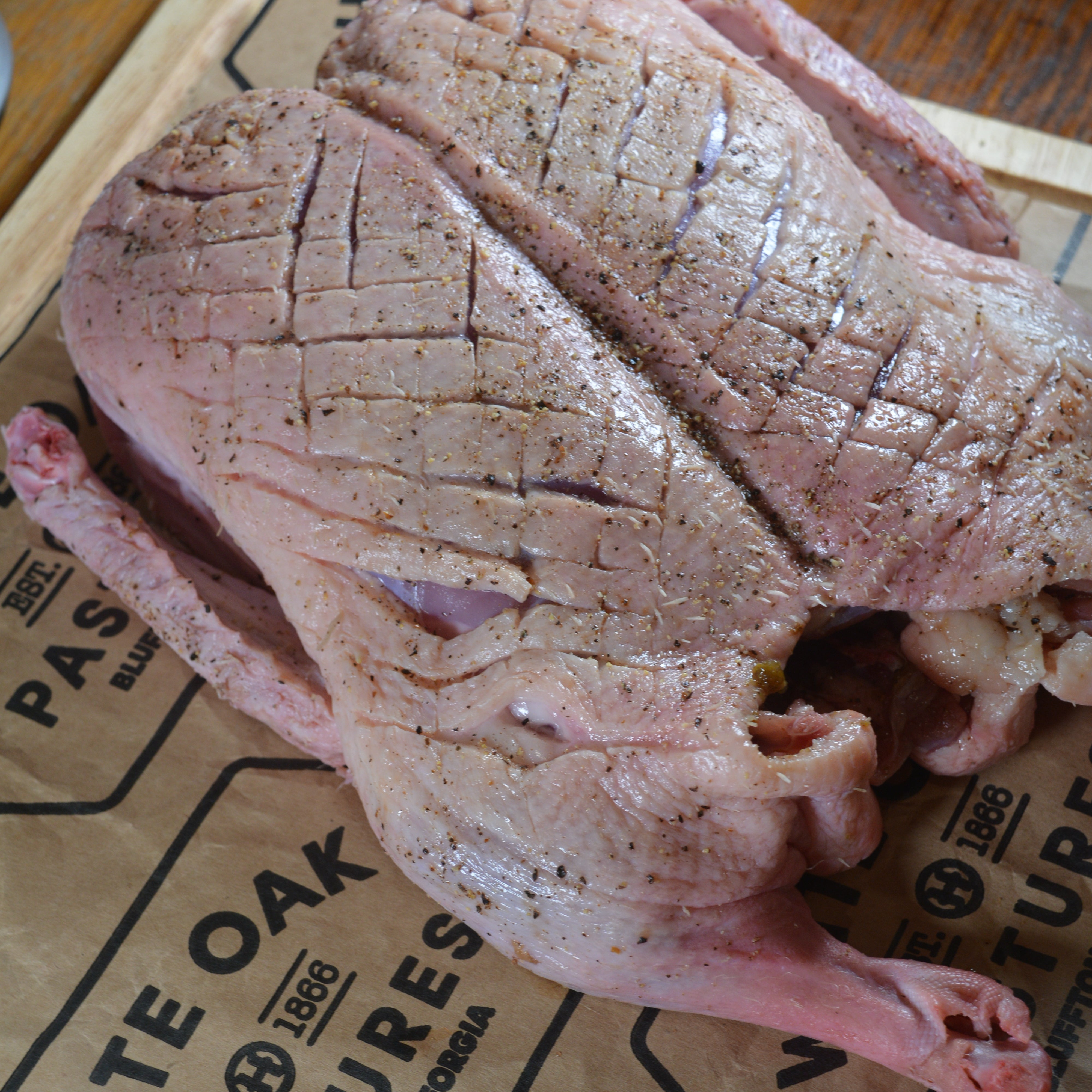 white oak pasture duck cooked to perfection on cinder grill