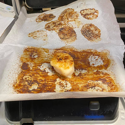 Scallops seared on parchment