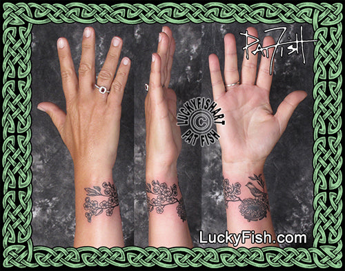 celtic motherhood knot wrist tattoo