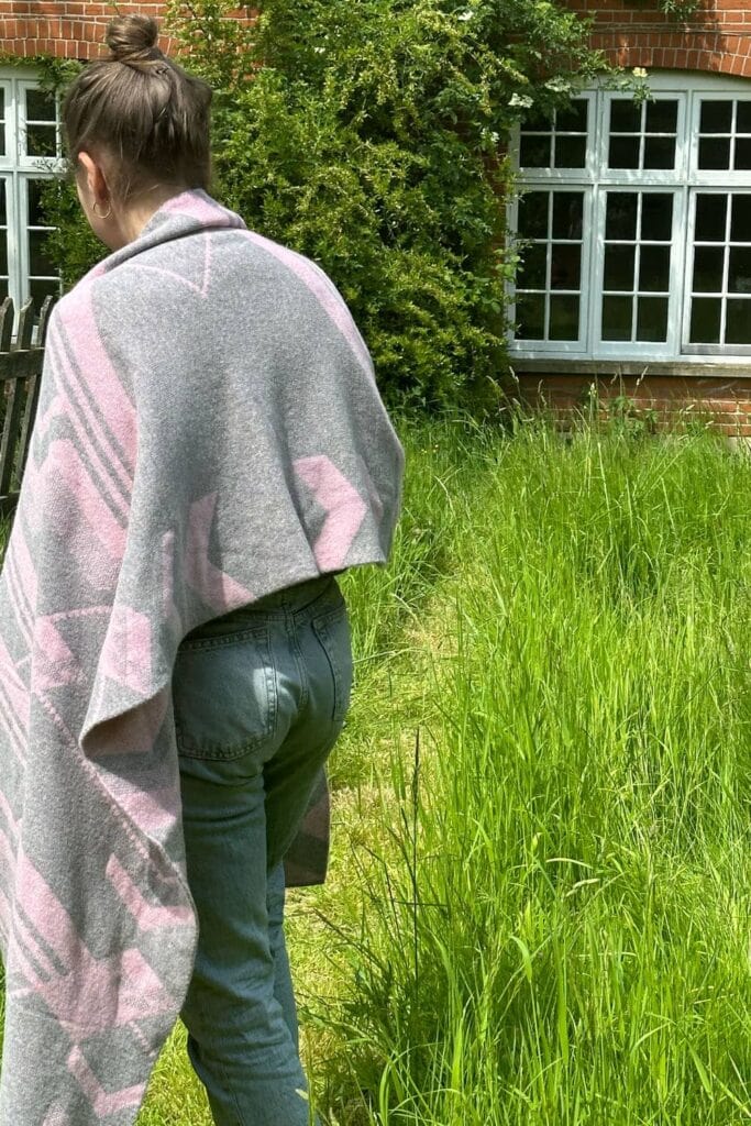 Genevieve Sweeney in the Geometric Lambswool Oversized Scarf Pink