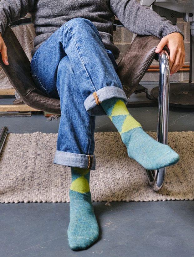 man wearing Samar Merino Wool Argyle Socks Lime styled with jeans