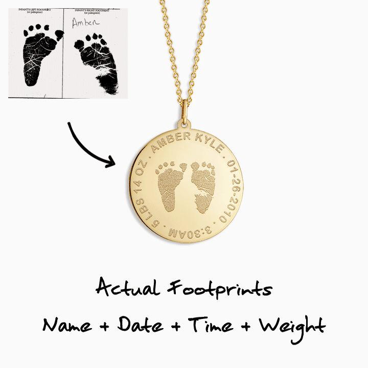 The front of this disc charm necklace is custom engraved with actual baby footprints, name, birth date, birth length and weight