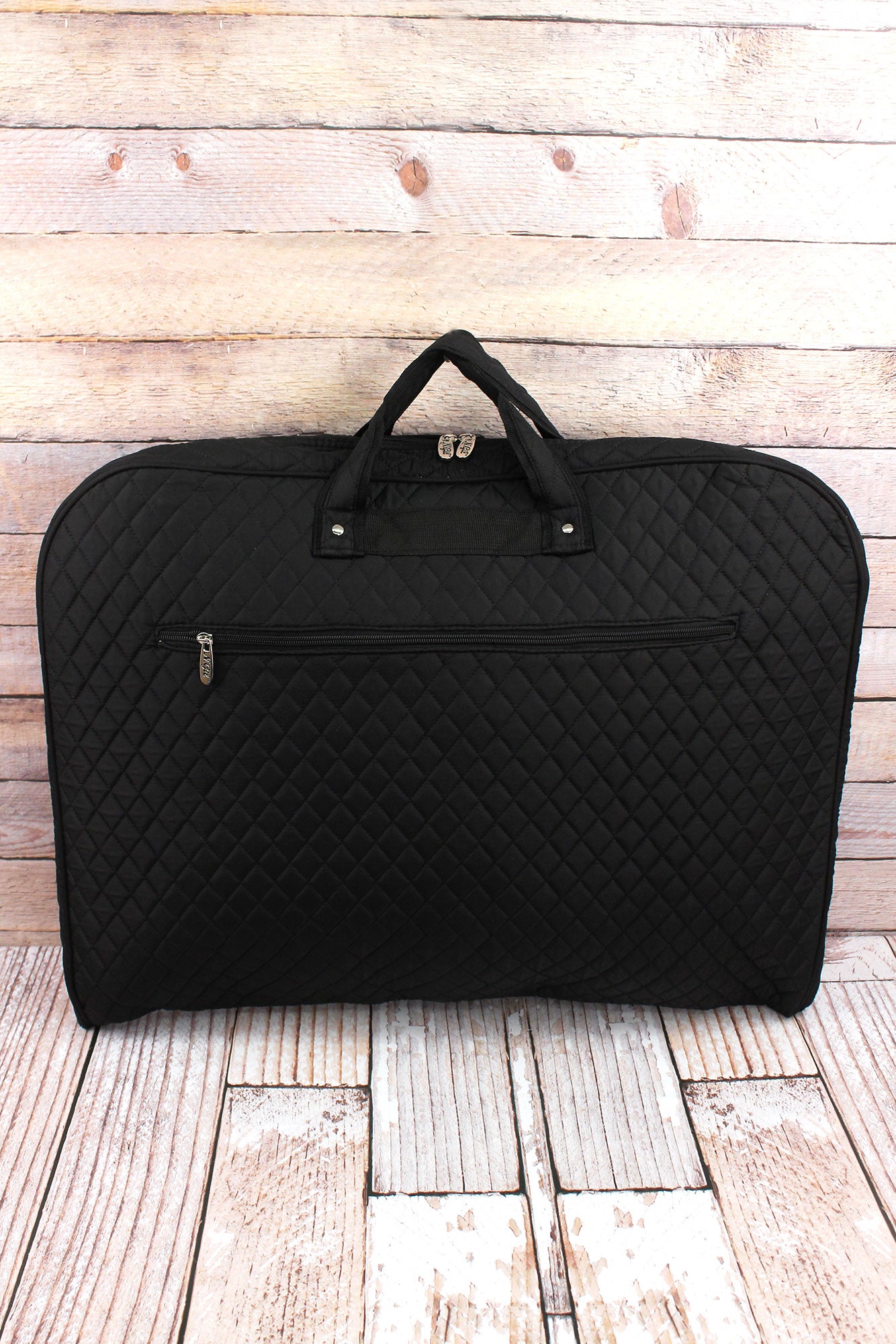 black quilted suitcase