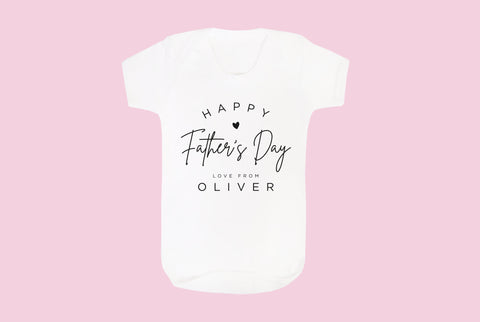 first father's day love from the babies name printed on a white baby vest