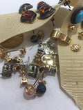 Pile of unidentified jewelry to take to Rubini Jewelers