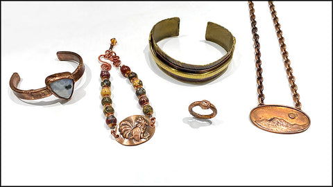 Copper and brass rings, bracelets, necklaces at Rubini Jewelers.
