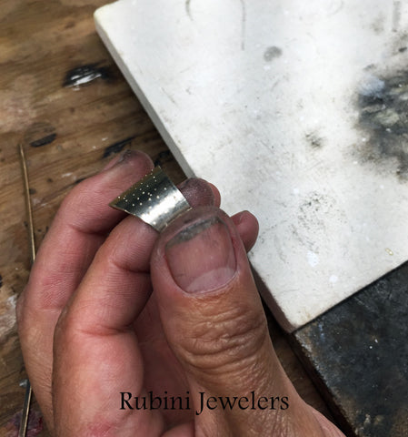 Step one in Rubini Jewelers creation of handmade 2tone gold swirl and diamond engagement ring