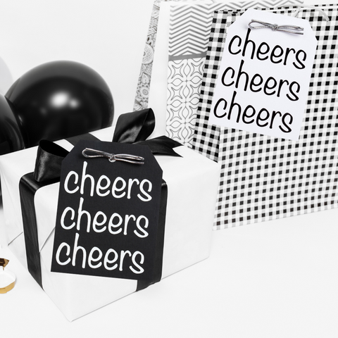 Cheers Gift Tags on Wrapped Black and White Presents