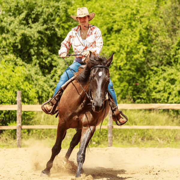 woman riding western horse saddle
