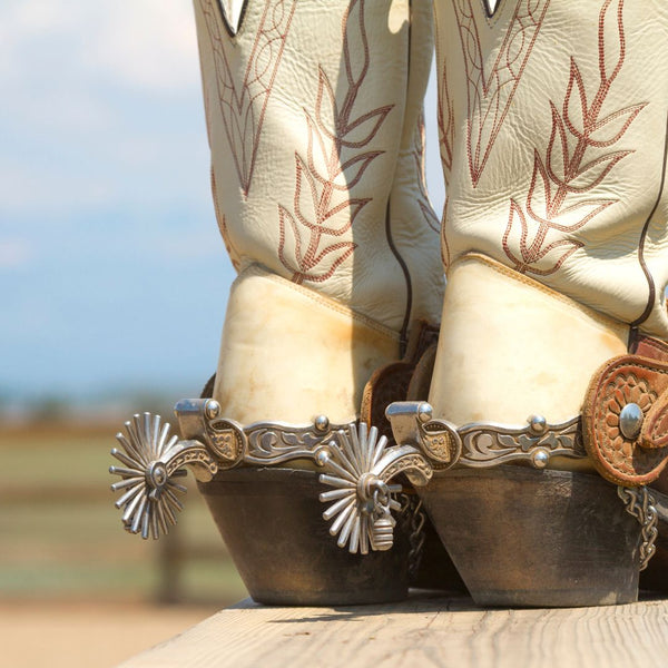 white ladies cowboy boots with silver metal western boot spurs