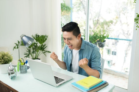 excited man getting an offer letter