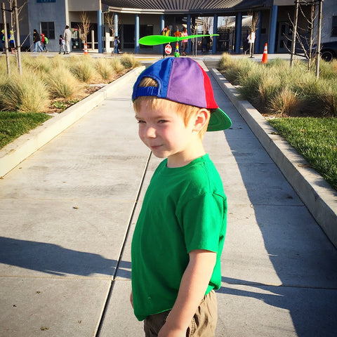 Kid with spinner hat