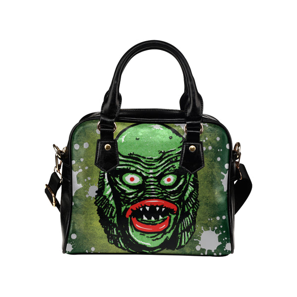 Creature on black lagoon Shoulder Handbag