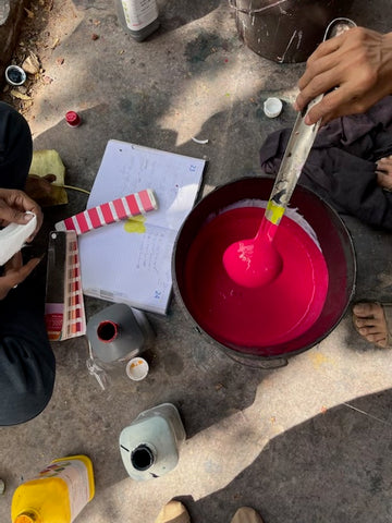 Pink dye being developed and matched to Pantone by Indian artisans