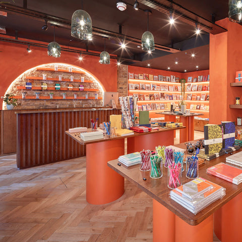 Interior of shop in bold orange.