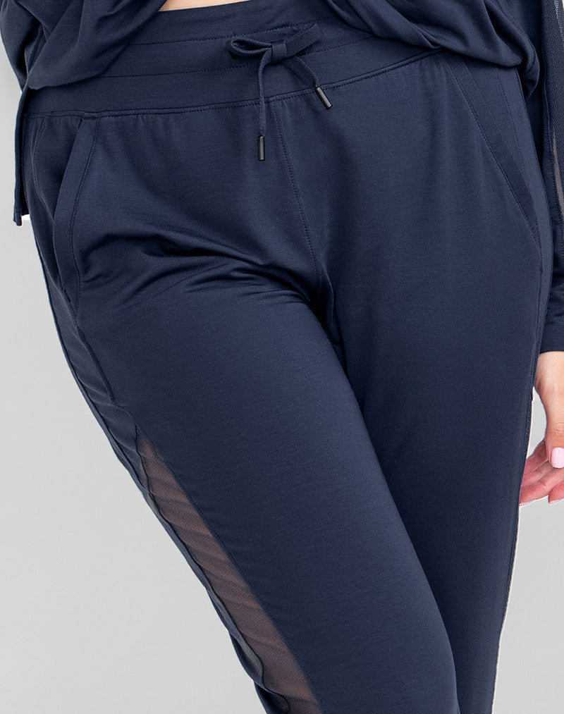 Detail of model wearing BlissWear Jogger in color Navy