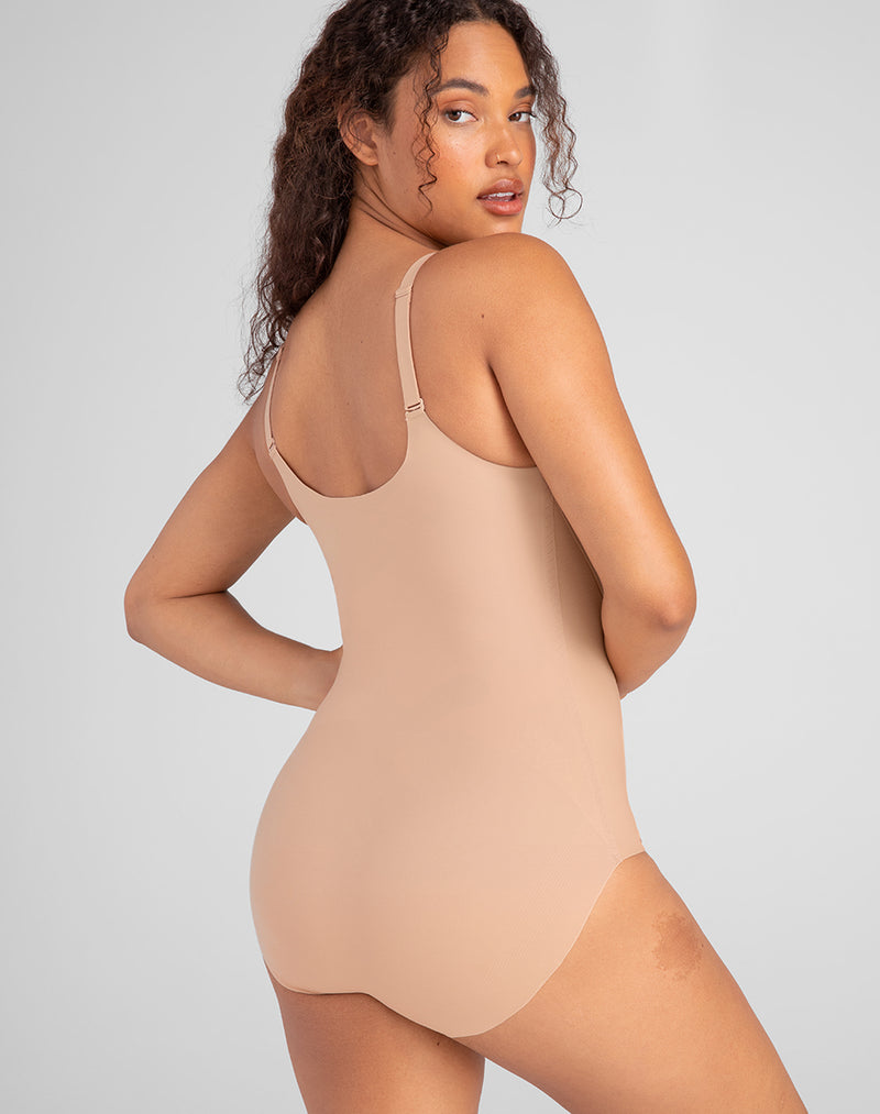 Model Mei wearing CrossOver Cami Bodysuit in size Medium and color Sand, seen from the Back