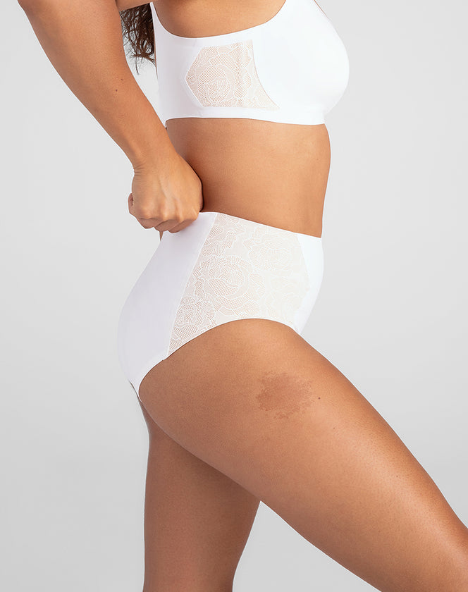Model Mei wearing lace-crossover-brief in size Medium and color Astral, seen from the Side