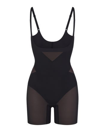 Open-Bust Mid-Thigh Bodysuit shown in Runway