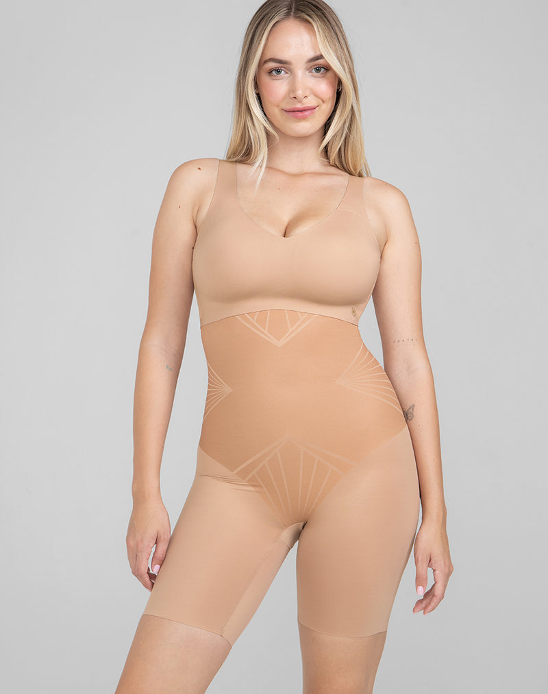 Model Raine wearing ShadowSculpt High-Waist Short in size Medium and color Sand, seen from the Front