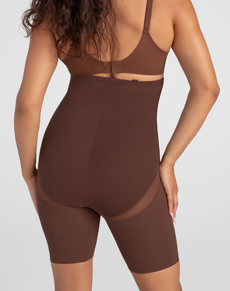 Model Mei wearing SuperPower Short in size Medium and color Mocha, seen from the Back