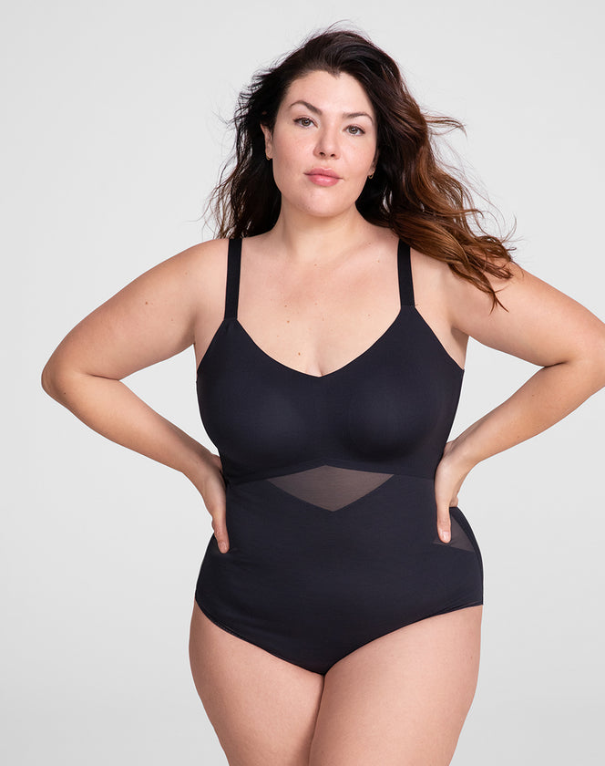 Model Natalie wearing cami-bodysuit in size Plus size one and color Runway, seen from the Front