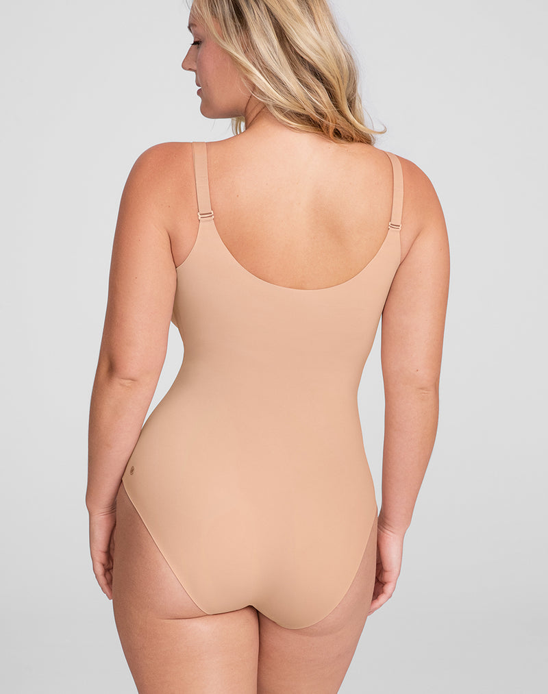 Model McCallah wearing Cami Bodysuit in size Large and color Sand, seen from the Back