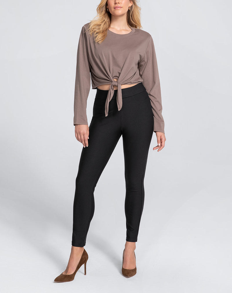 Model Elle wearing EverReady Pant in size Medium and color Jet Black, seen from the Front