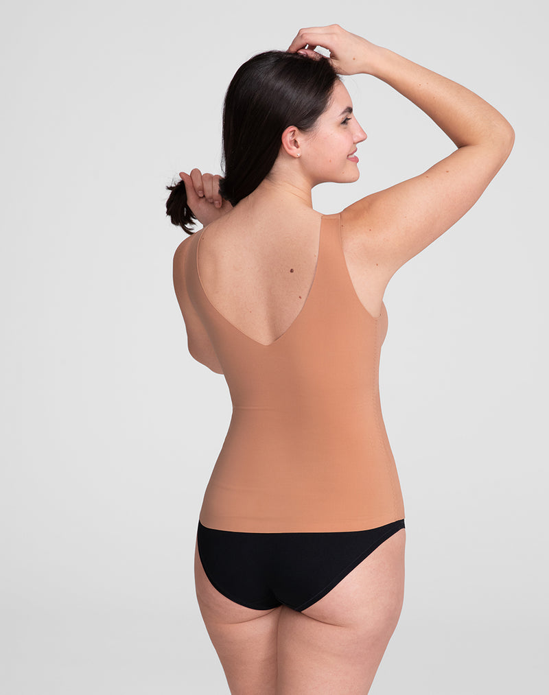 Model Hannah wearing LiftWear Tank in size Medium and color Cinnamon, seen from the Back