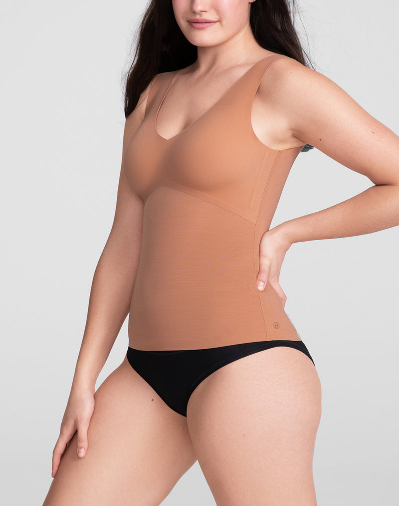 Model Hannah wearing LiftWear Tank in size Medium and color Cinnamon, seen from the Side